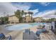 Resort-style community pool featuring ample seating and a refreshing oasis at 6745 Caporetto Ln # 104, North Las Vegas, NV 89084