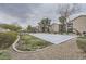Community volleyball court surrounded by landscaping for residents to enjoy at 6745 Caporetto Ln # 104, North Las Vegas, NV 89084