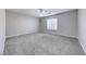 Clean bedroom with neutral walls, plush carpeting and window for lots of natural light at 7479 Lassen Peak Cir, Las Vegas, NV 89149