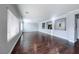 Bright and open living room with hardwood floors and decorative wall cut-outs at 7479 Lassen Peak Cir, Las Vegas, NV 89149