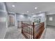 Upstairs loft with views of the landing and multiple doorways and a decorative painting at 7479 Lassen Peak Cir, Las Vegas, NV 89149