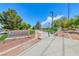 View of Gilcrease Brothers Park with walking path and greenery at 7479 Lassen Peak Cir, Las Vegas, NV 89149