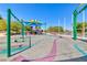 Colorful playground features swings and slides, offering a fun and active recreational space for  at 7479 Lassen Peak Cir, Las Vegas, NV 89149