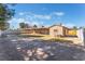 Spacious backyard featuring a covered patio, perfect for outdoor entertaining and relaxation at 849 Parkhurst St, Las Vegas, NV 89110