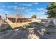 Large backyard with a covered patio, offering ample space for recreation and enjoying the outdoors at 849 Parkhurst St, Las Vegas, NV 89110