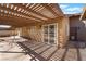 Covered patio with an extended concrete slab, perfect for outdoor gatherings and enjoying the backyard at 849 Parkhurst St, Las Vegas, NV 89110