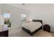 A bedroom that has access to the backyard at 912 Calluna Hills Ln, Las Vegas, NV 89138