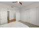 A clean bedroom that has access to a closet and an adjoining room at 912 Calluna Hills Ln, Las Vegas, NV 89138