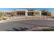 Striking community clubhouse featuring modern architecture and desert landscaping at 912 Calluna Hills Ln, Las Vegas, NV 89138