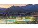 This is a view of a community pool with mountain views at 912 Calluna Hills Ln, Las Vegas, NV 89138