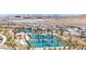 Aerial view of pickleball courts within the community, surrounded by desert landscape and homes at 912 Calluna Hills Ln, Las Vegas, NV 89138