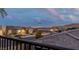A neighborhood street view looking out to Las Vegas and the mountains beyond at 912 Calluna Hills Ln, Las Vegas, NV 89138