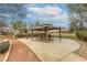 This neighborhood features a community park with a gazebo, picnic tables, and walking paths at 9432 Victory Garden Ave, Las Vegas, NV 89149