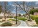 Beautiful community park featuring walking paths, lush landscaping, and well-maintained green spaces in a residential area at 9432 Victory Garden Ave, Las Vegas, NV 89149