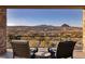Balcony seating features stunning view of the lake and desert mountains at 10 Via Potenza Ct, Henderson, NV 89011