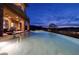 Luxurious infinity pool with breathtaking views, seamless design, and inviting ambiance for ultimate relaxation at 10 Via Potenza Ct, Henderson, NV 89011