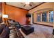Cozy sitting area with comfortable leather furniture and a view to the outside at 10 Via Potenza Ct, Henderson, NV 89011