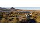 A scenic view overlooking the lush community and tranquil lake at 10 Via Potenza Ct, Henderson, NV 89011
