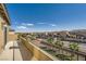 A balcony with dark metal railing looks out over the neighborhood at 10173 Skye Saddle Ave, Las Vegas, NV 89166