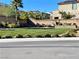 Neighborhood park with manicured lawn, garden areas, walking paths, and seating at 10173 Skye Saddle Ave, Las Vegas, NV 89166