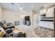 Cozy living room with carpeted floors and a seamless transition into the adjacent kitchen area at 10173 Skye Saddle Ave, Las Vegas, NV 89166