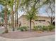 Community building featuring 'Arts and Crafts' signage, complemented by landscaping and mature trees at 10401 Sea Palms Ave, Las Vegas, NV 89134