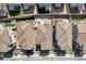 Drone shot of neighborhood homes highlighting the roof and backyard layouts at 10619 Carnes Ave, Las Vegas, NV 89166