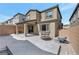 View of backyard with covered patio and block wall, offering potential for landscaping and outdoor enjoyment at 10619 Carnes Ave, Las Vegas, NV 89166