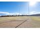 Community field offers a versatile green space for outdoor activities and recreation at 10619 Carnes Ave, Las Vegas, NV 89166