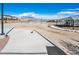 Community playground with a large shade structure, offering a fun recreational space at 10619 Carnes Ave, Las Vegas, NV 89166