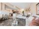 Open-concept living room connected to the kitchen and dining area with tile flooring at 1259 N Hollywood Blvd, Las Vegas, NV 89110