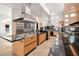 Spacious kitchen with granite countertops, stainless steel appliances, and bright natural light at 1484 Macdonald Ranch Dr, Henderson, NV 89012