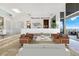 Bright living room with comfortable seating, marble floors, and stylish decor accents at 1484 Macdonald Ranch Dr, Henderson, NV 89012