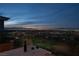 Enjoy stunning city skyline views from your outdoor living space, perfect for relaxing and entertaining at 1484 Macdonald Ranch Dr, Henderson, NV 89012