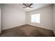 Neutral bedroom with carpet, ceiling fan and natural light from a window at 1704 N Jones Blvd, Las Vegas, NV 89108