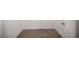 Narrow shot of carpet inside a walk-in closet, featuring baseboards and an open doorway at 1704 N Jones Blvd, Las Vegas, NV 89108