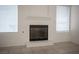 Close-up of the fireplace in the living room with decorative mantel and tile floor at 1704 N Jones Blvd, Las Vegas, NV 89108