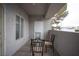 Condo covered patio featuring a table and chairs; perfect for enjoying the outdoors at 1704 N Jones Blvd, Las Vegas, NV 89108