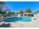 Sparkling community pool area with sun loungers, a gazebo, and lush surroundings at 2109 Willowbury Dr # C, Las Vegas, NV 89108