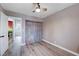 Neutral bedroom with closet, hardwood flooring, and access to an adjoining room at 2724 Monrovia Dr, Las Vegas, NV 89117