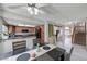 Open dining area with wood table and chairs connects the kitchen and living spaces at 2724 Monrovia Dr, Las Vegas, NV 89117