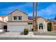 Beautiful two-story home with a two-car garage, solar panels, and neat front yard at 2724 Monrovia Dr, Las Vegas, NV 89117