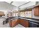 Granite counters, sink and view to pool from this stylishly updated kitchen at 2724 Monrovia Dr, Las Vegas, NV 89117