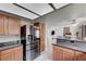 This open kitchen features stainless appliances and granite countertops at 2724 Monrovia Dr, Las Vegas, NV 89117