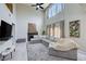 Bright and airy living room with vaulted ceilings, fireplace, and large windows offering plenty of natural light at 2724 Monrovia Dr, Las Vegas, NV 89117