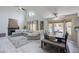 Spacious living room with high ceilings, fireplace, and adjacent dining area offering ample entertaining space at 2724 Monrovia Dr, Las Vegas, NV 89117