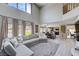 The living space offers an open floor plan to the dining and kitchen areas with pool views at 2724 Monrovia Dr, Las Vegas, NV 89117