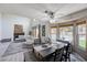 Open floor plan integrates the living room, dining area, and outdoor pool view at 2724 Monrovia Dr, Las Vegas, NV 89117