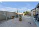 Spacious backyard with gravel and landscaping offers a serene outdoor space at 2804 Gallant Hills Dr, Las Vegas, NV 89135