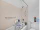 Bathroom with a bathtub and shower, featuring safety bars and accessibility aids at 2804 Gallant Hills Dr, Las Vegas, NV 89135